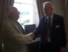 Outgoing President Maurice Weaver hands over to President for 2010-2011 Martin Reynolds.